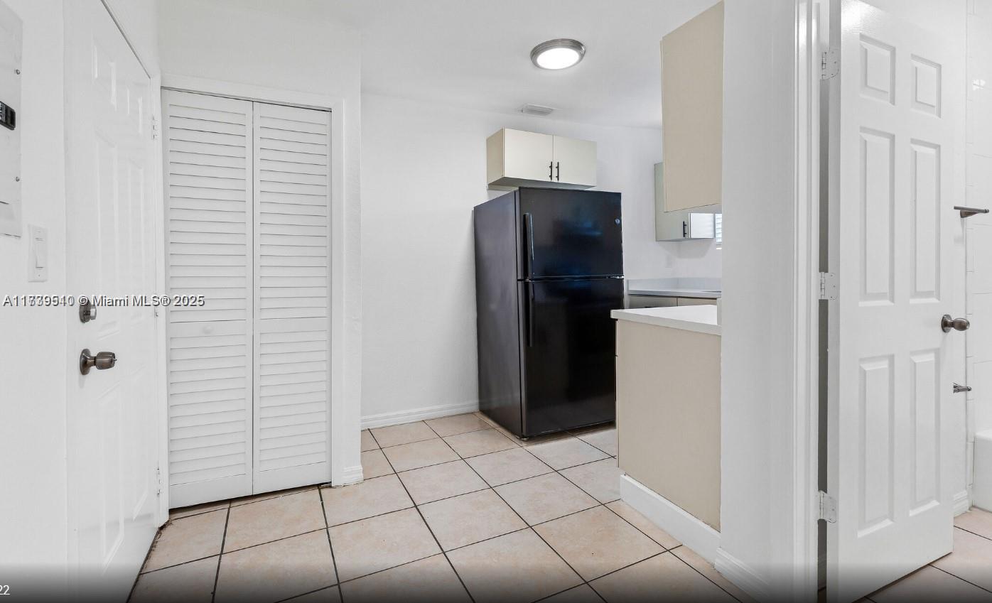 121 Northeast 55th Street Miami, FL 33137 - Photo 14 of 16 a view of a utility room with closet