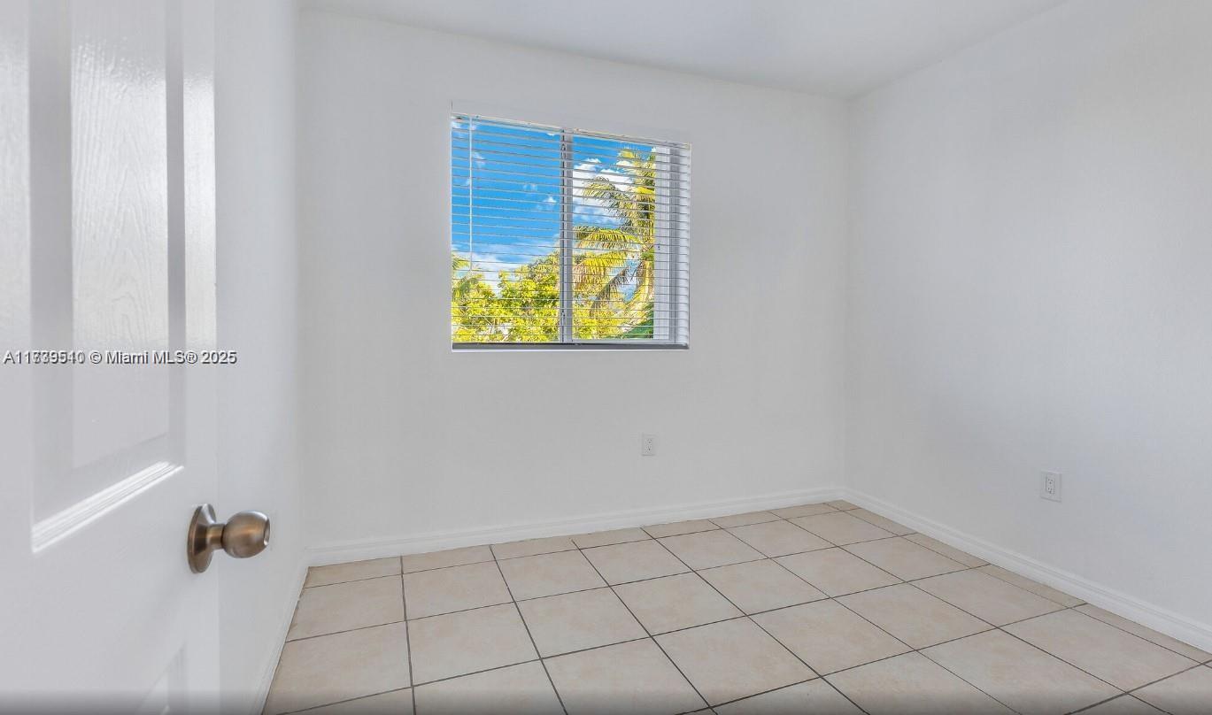 121 Northeast 55th Street Miami, FL 33137 - Photo 15 of 16 a view of an empty room