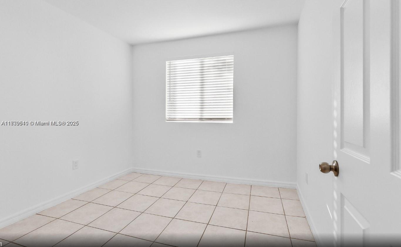 121 Northeast 55th Street Miami, FL 33137 - Photo 9 of 16 a view of an empty room