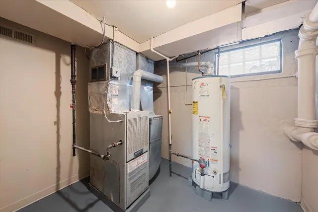 a view of walk in closet with white walls