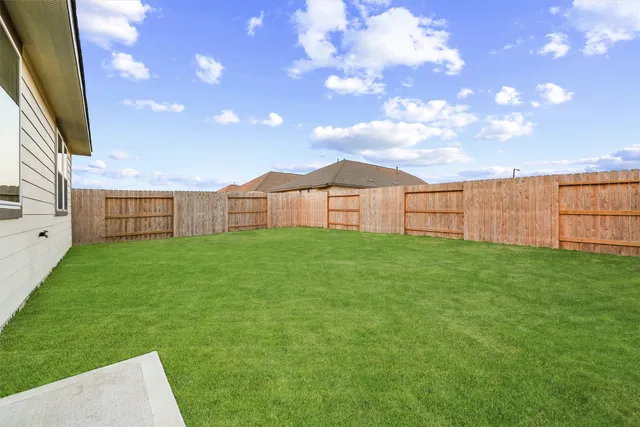 a view of a backyard with garden