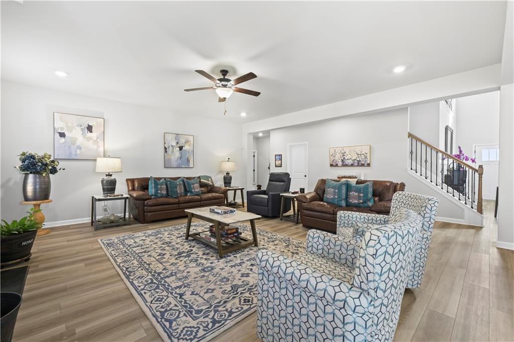 3258 Thicket Lane Atlanta, GA 30349 - Photo 12 of 38 a living room with furniture and wooden floor