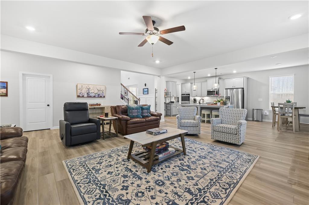 3258 Thicket Lane Atlanta, GA 30349 - Photo 13 of 38 a living room with furniture and a rug