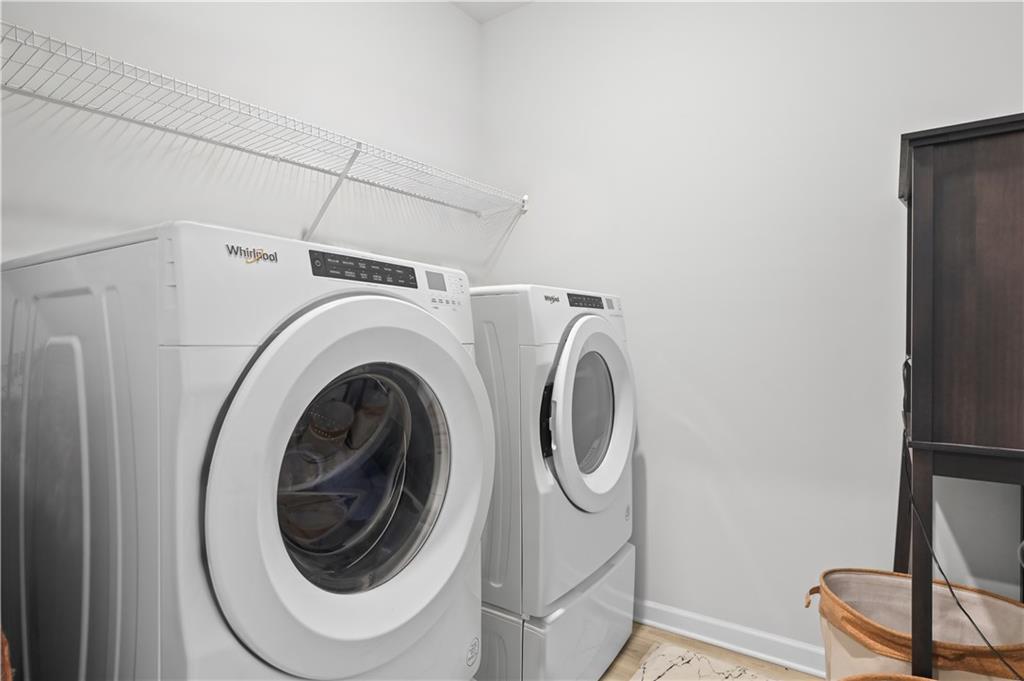 3258 Thicket Lane Atlanta, GA 30349 - Photo 19 of 38 a utility room with dryer and washer