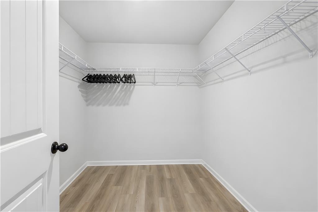 3258 Thicket Lane Atlanta, GA 30349 - Photo 22 of 38 a view of a room with racks on the wall