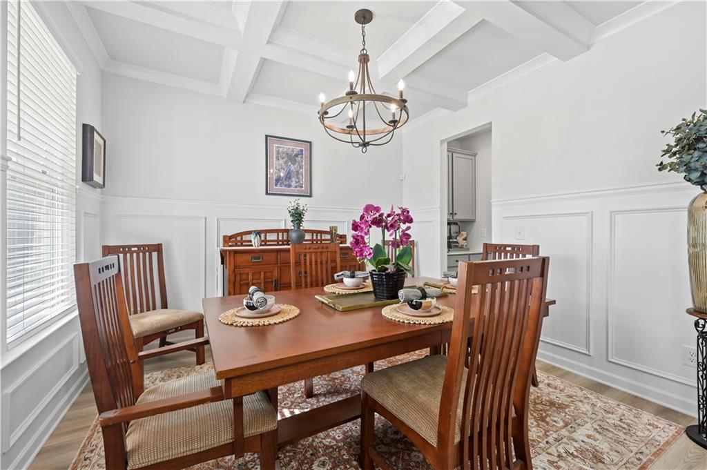 3258 Thicket Lane Atlanta, GA 30349 - Photo 4 of 38 a view of a dining room with furniture window and wooden floor