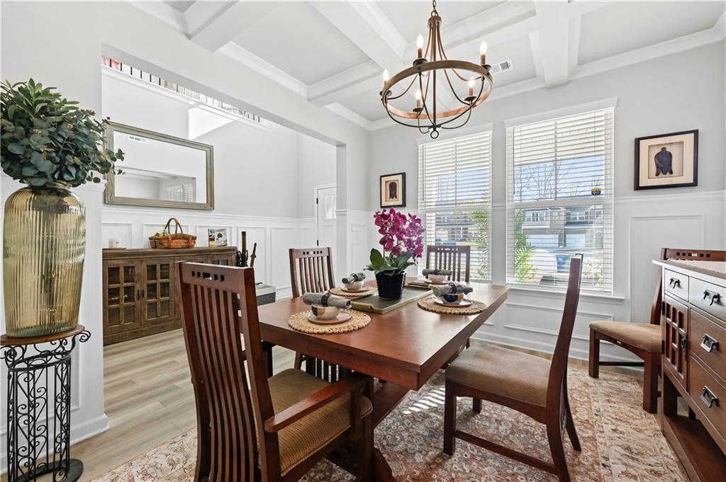 3258 Thicket Lane Atlanta, GA 30349 - Photo 5 of 38 a view of a dining room with furniture window and wooden floor