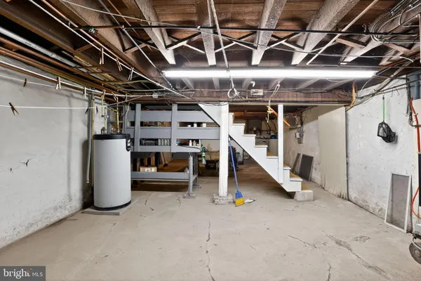 a view of an empty room with white walls