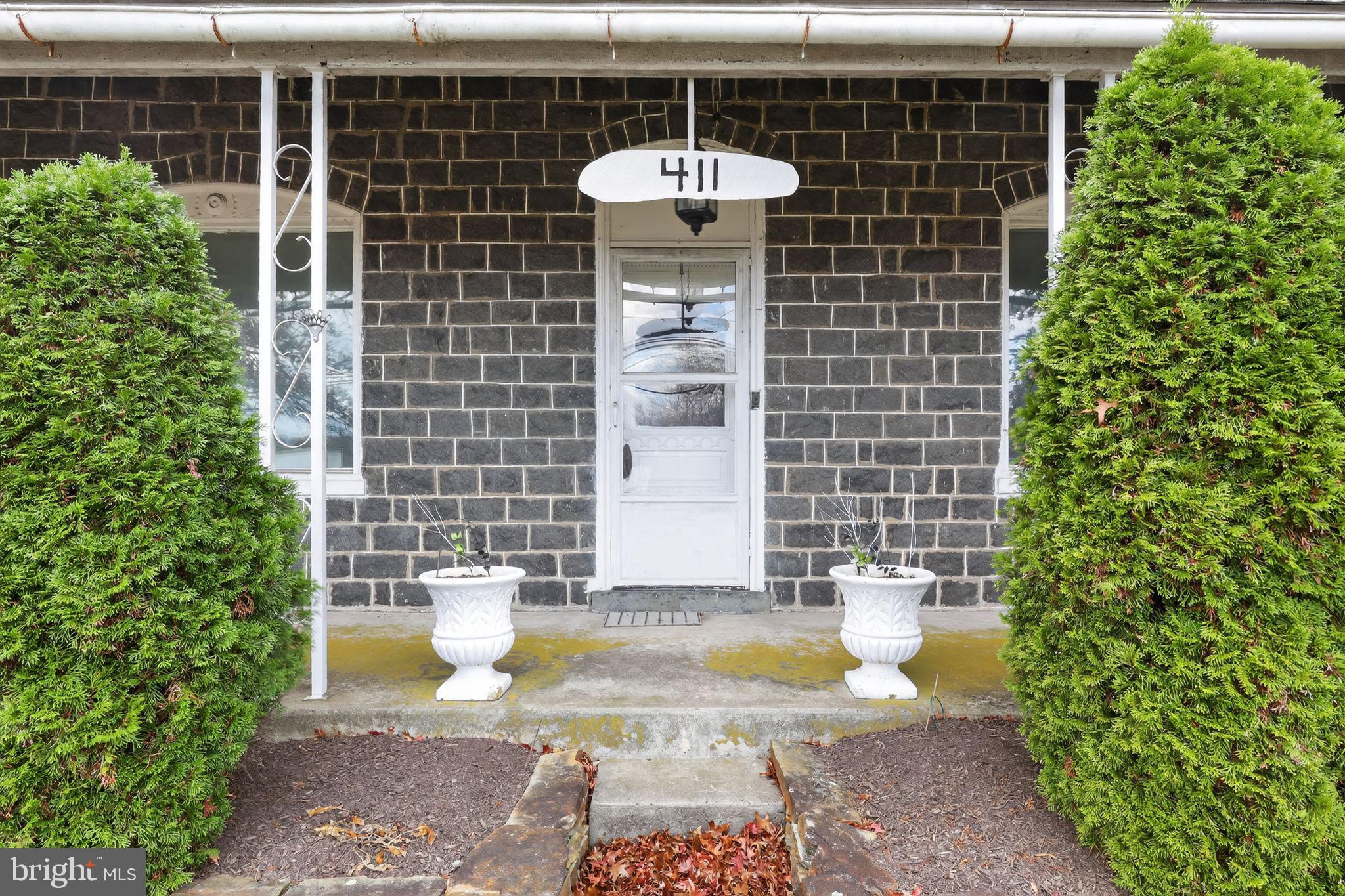 411 Swamp Pike Pottstown, PA 19464 - Photo 41 of 41 a view of a bathtub in the backyard with potted plants