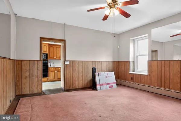 a living room with furniture and window