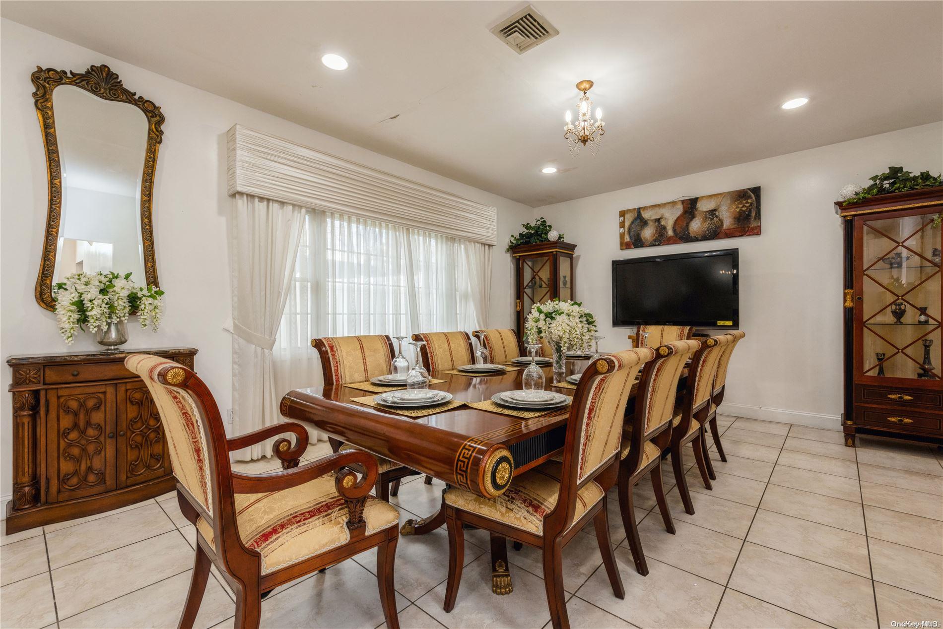 968 Bowe Road Valley Stream, NY 11580 - Photo 12 of 36 a view of a dining room with furniture