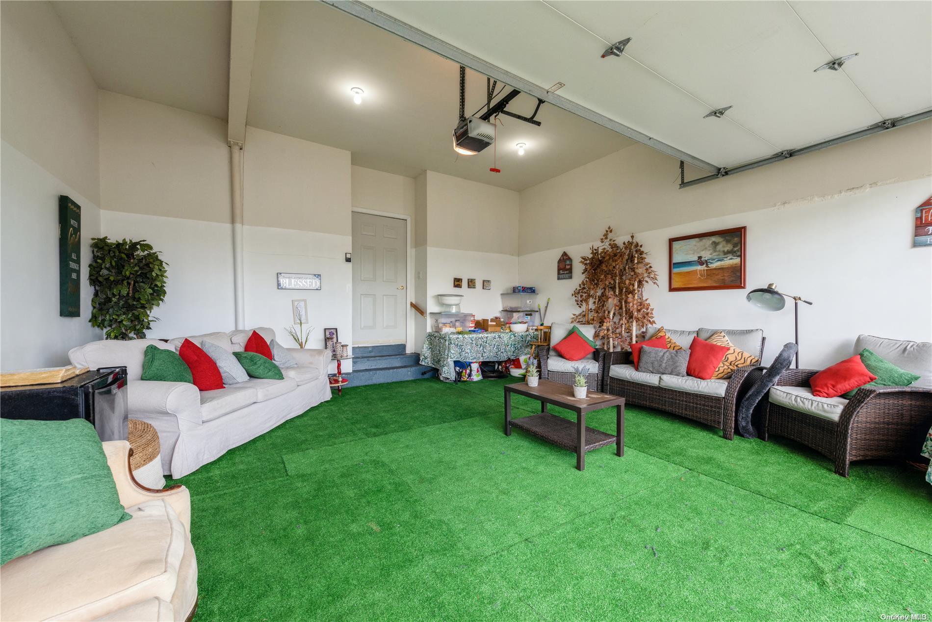 968 Bowe Road Valley Stream, NY 11580 - Photo 19 of 36 a living room with furniture and a wooden floor