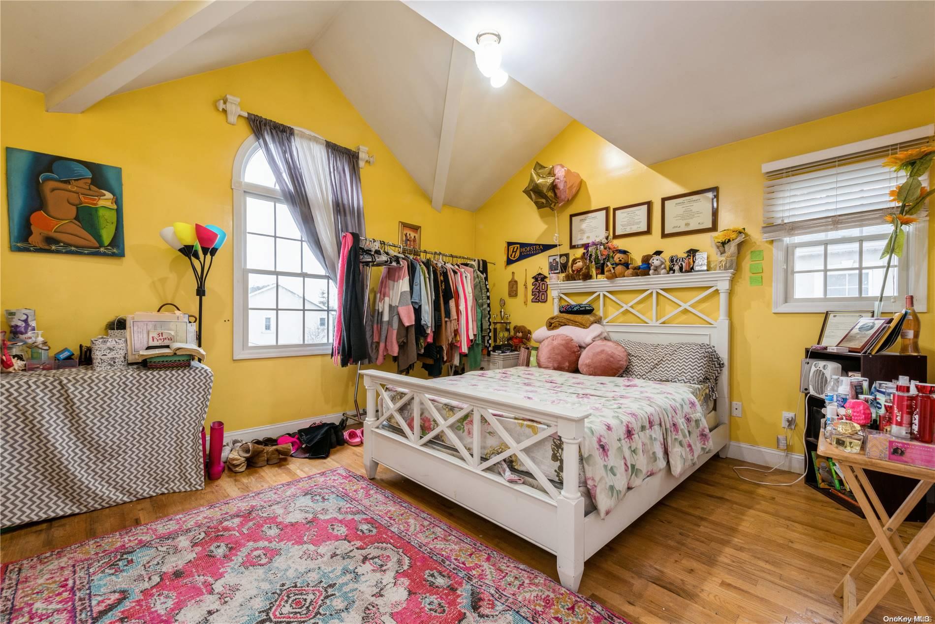 968 Bowe Road Valley Stream, NY 11580 - Photo 27 of 36 a bedroom with a bed and a window