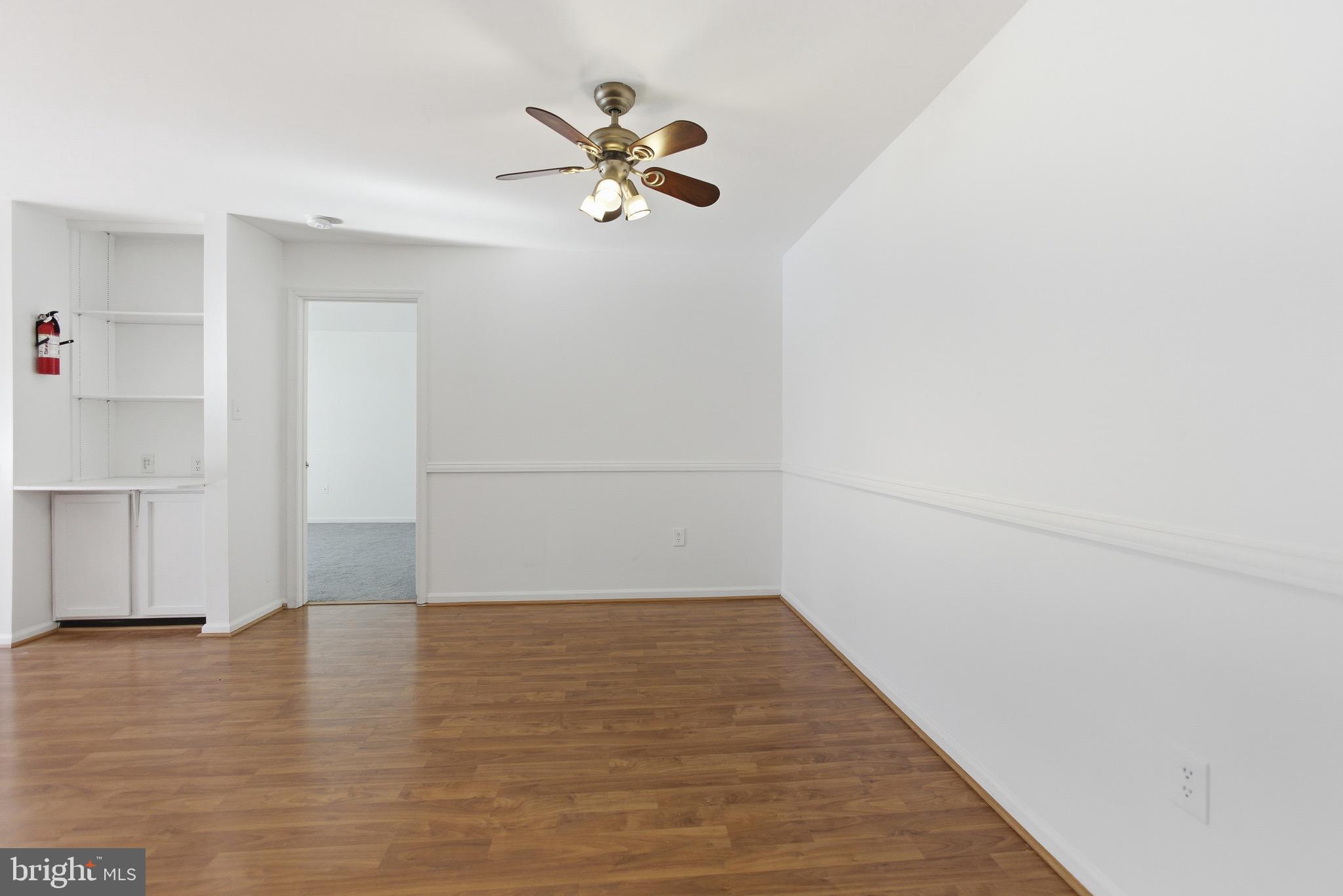 20565 Shadyside Way Germantown, MD 20874 - Photo 5 of 17 a view of a room with wooden floor and closet
