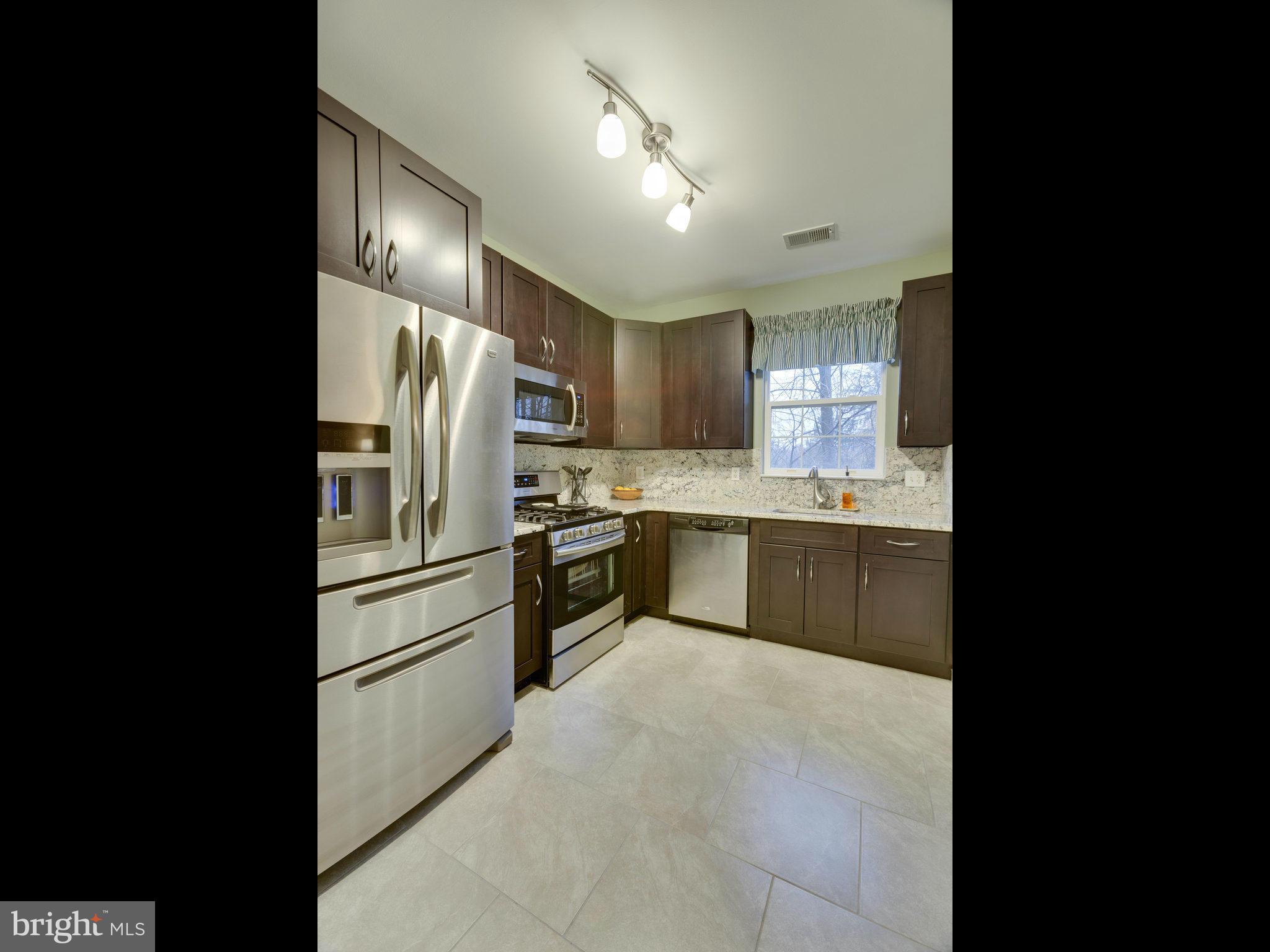 11401 Gate Hill Place, Unit 77 Reston, VA 20194 - Photo 12 of 30 Kitchen