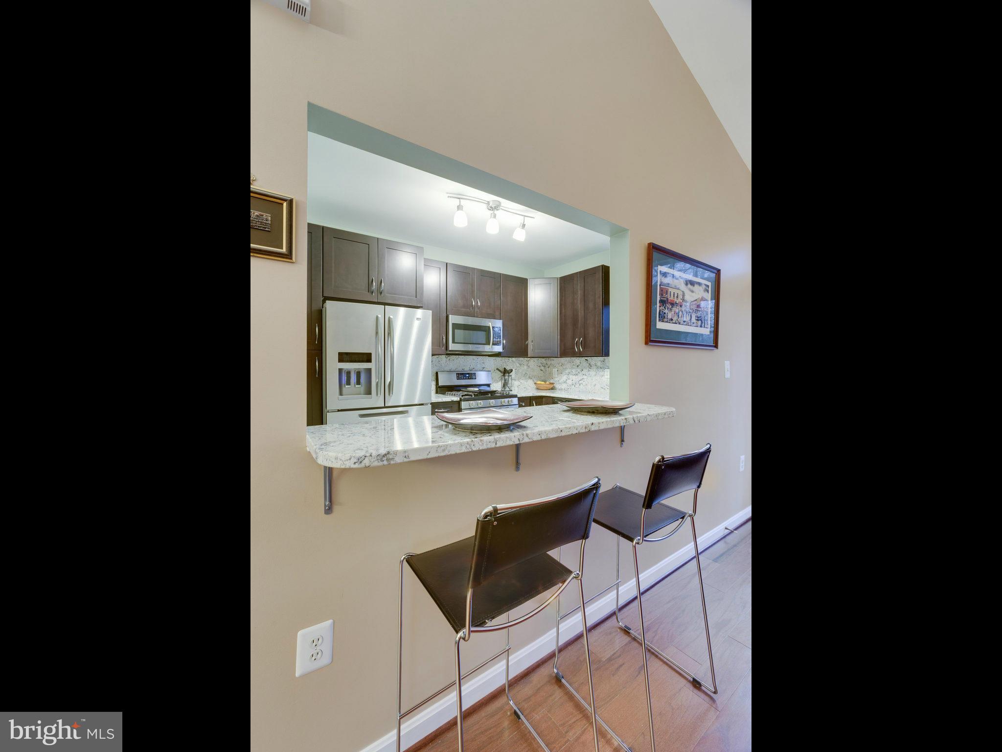 11401 Gate Hill Place, Unit 77 Reston, VA 20194 - Photo 10 of 30 Kitchen