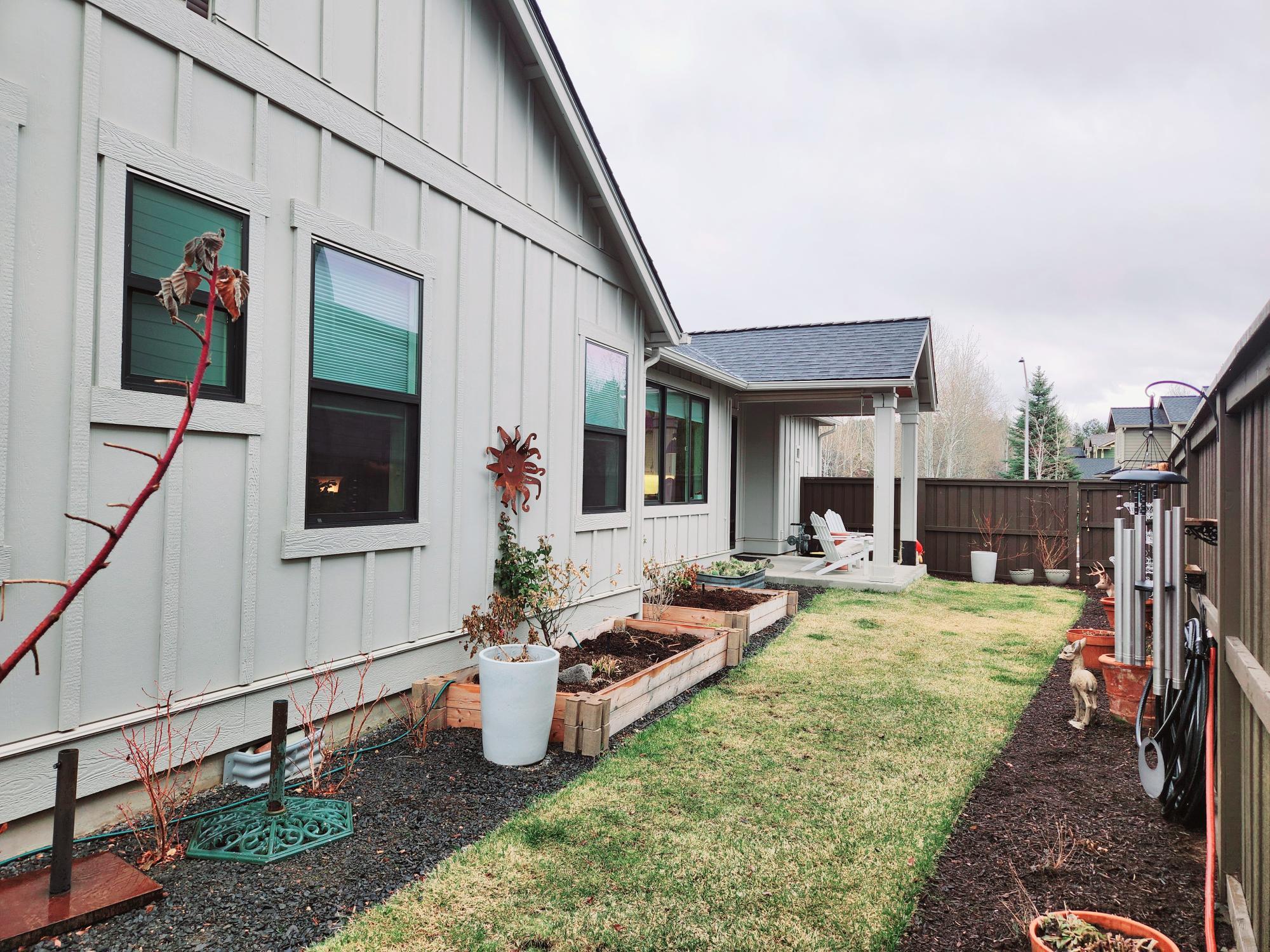 2345 Northwest Skyline Ranch Road Bend, OR 97703 - Photo 18 of 20 Fenced yard with flower beds.