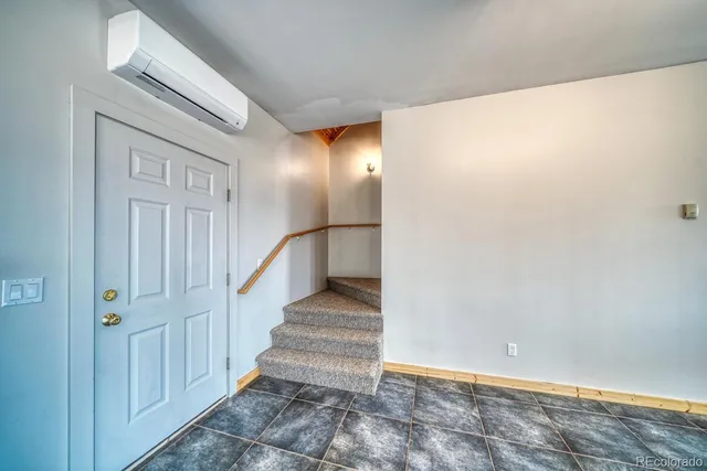 a view of entryway with stairs