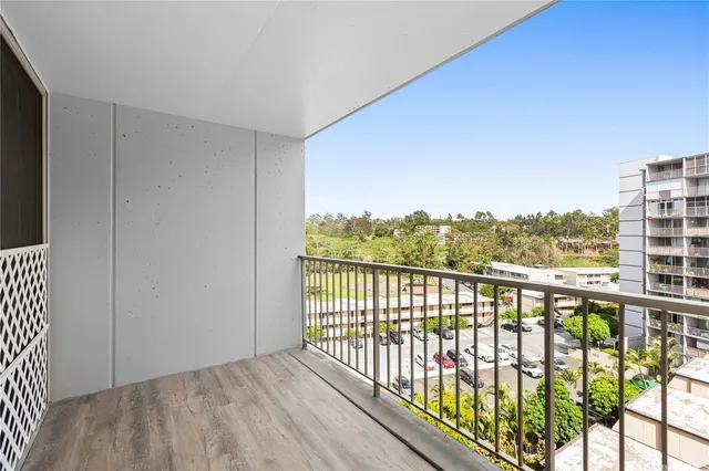 a view of balcony with furniture