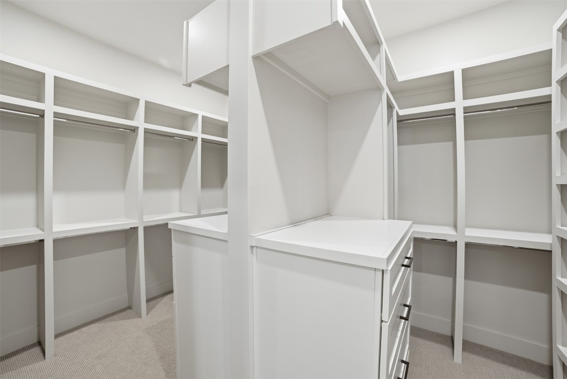 23937 Oscar Road Spicewood, TX 78669 - Photo 18 of 36 a utility room with washer and dryer