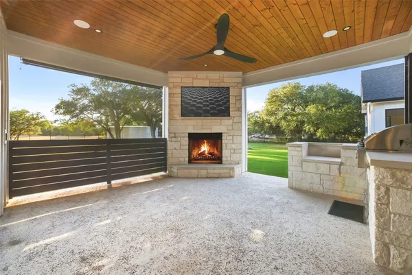 a view of room with furniture and a fireplace