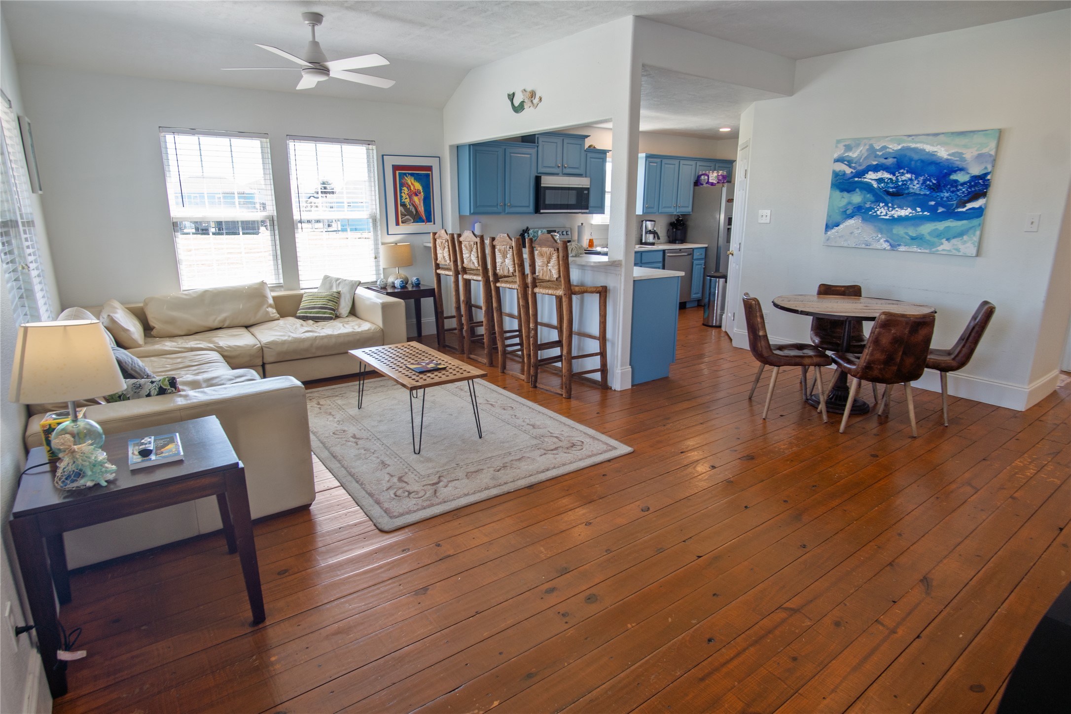2371 Sandman Crystal Beach, TX 77650 - Photo 13 of 38 a living room with furniture and a wooden floor