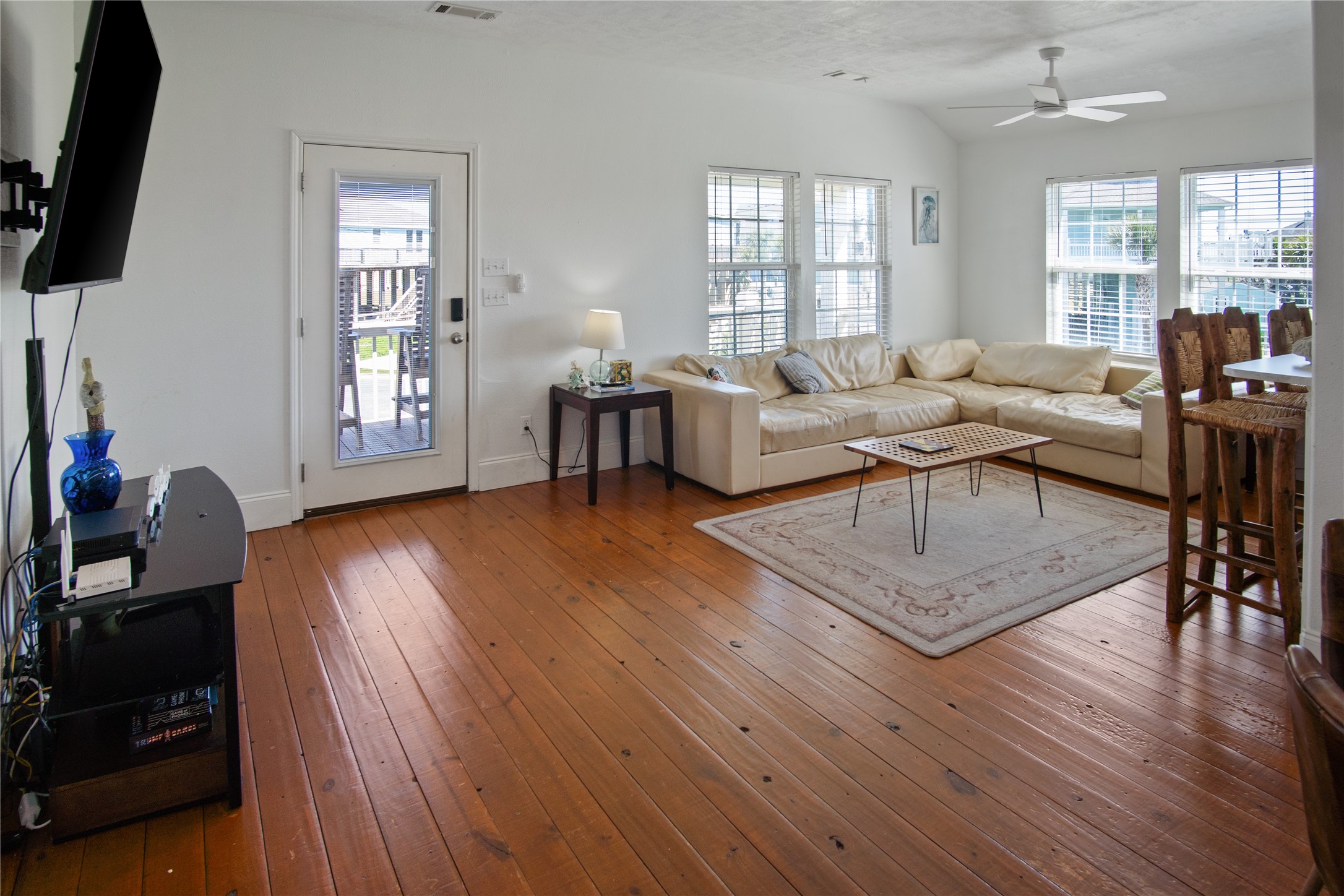 2371 Sandman Crystal Beach, TX 77650 - Photo 14 of 38 a living room with furniture and a wooden floor