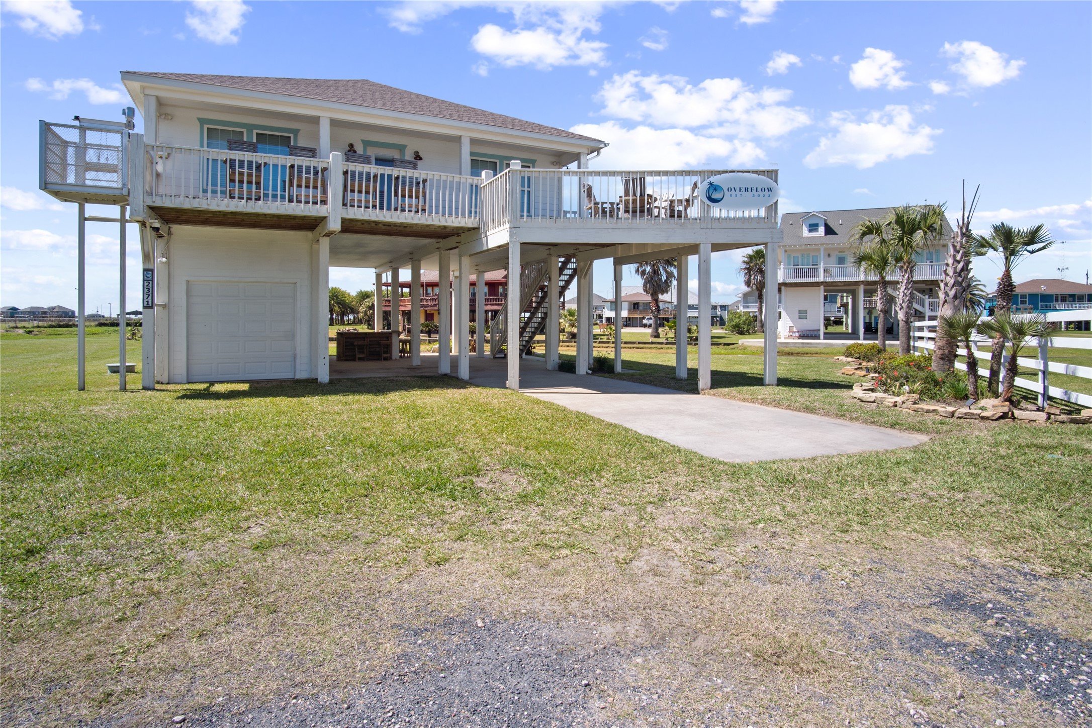 2371 Sandman Crystal Beach, TX 77650 - Photo 2 of 38 a view of a house with a yard and sitting area