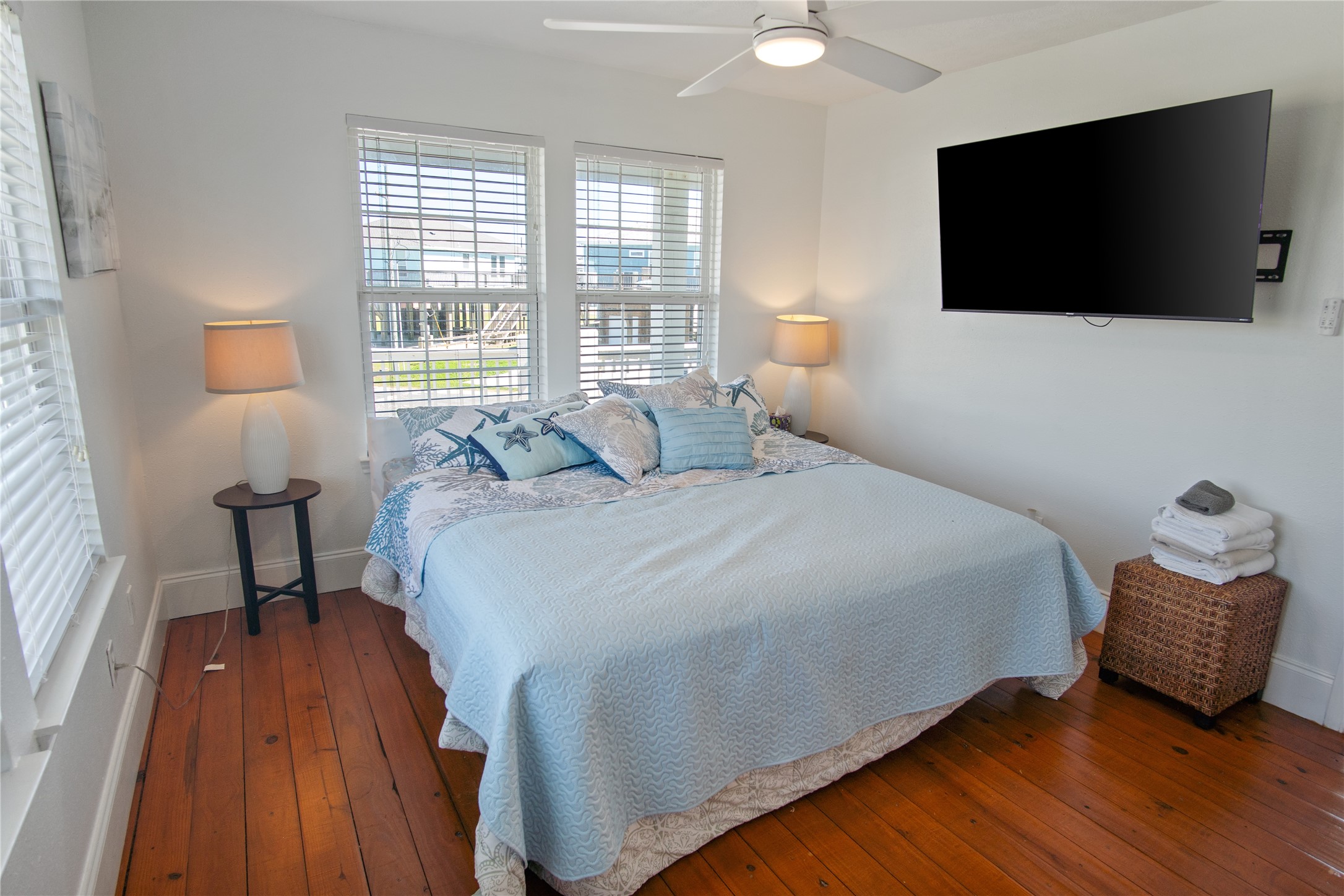 2371 Sandman Crystal Beach, TX 77650 - Photo 24 of 38 a bedroom with a bed and a flat screen tv