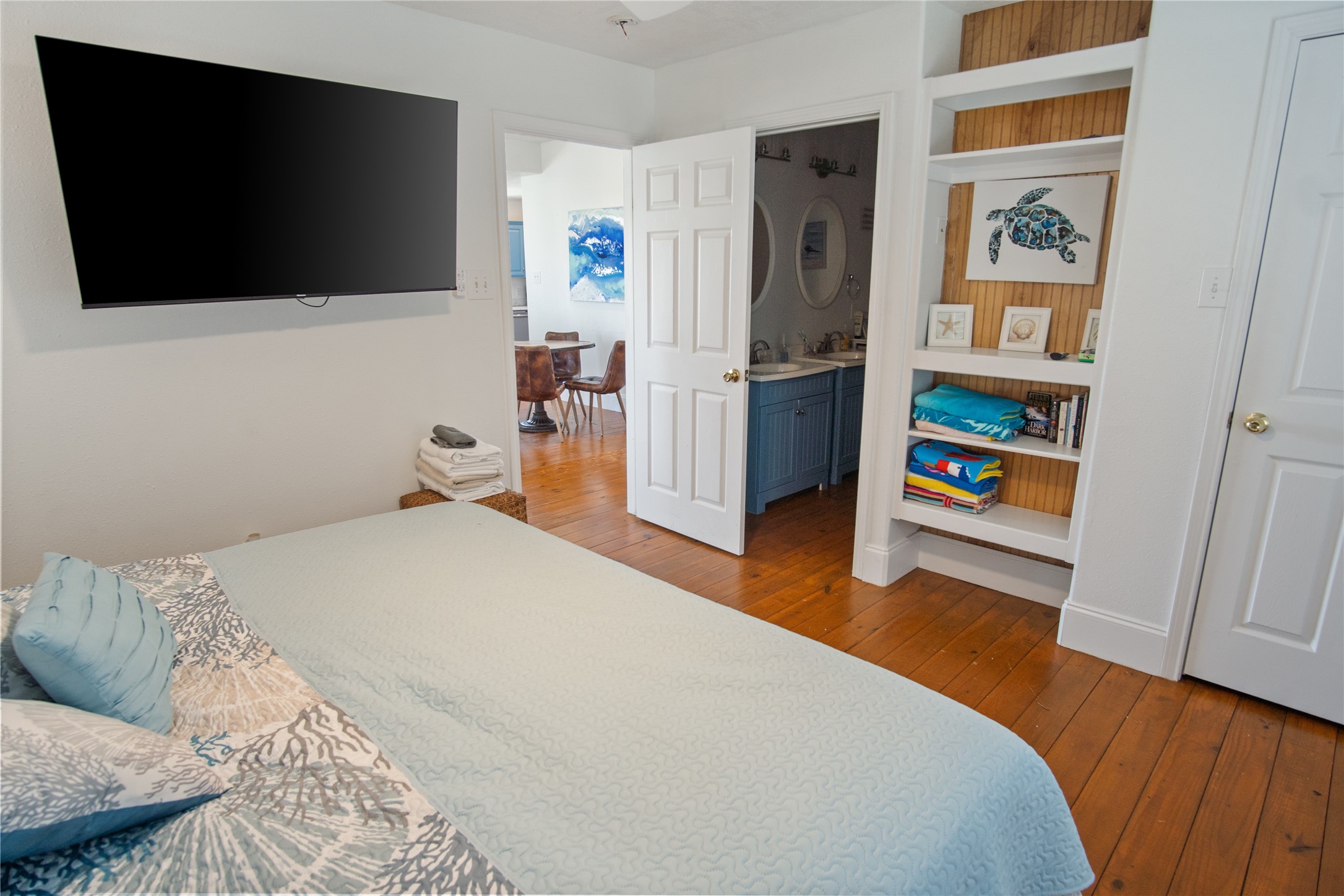 2371 Sandman Crystal Beach, TX 77650 - Photo 28 of 38 a bedroom with a bed and a flat screen tv