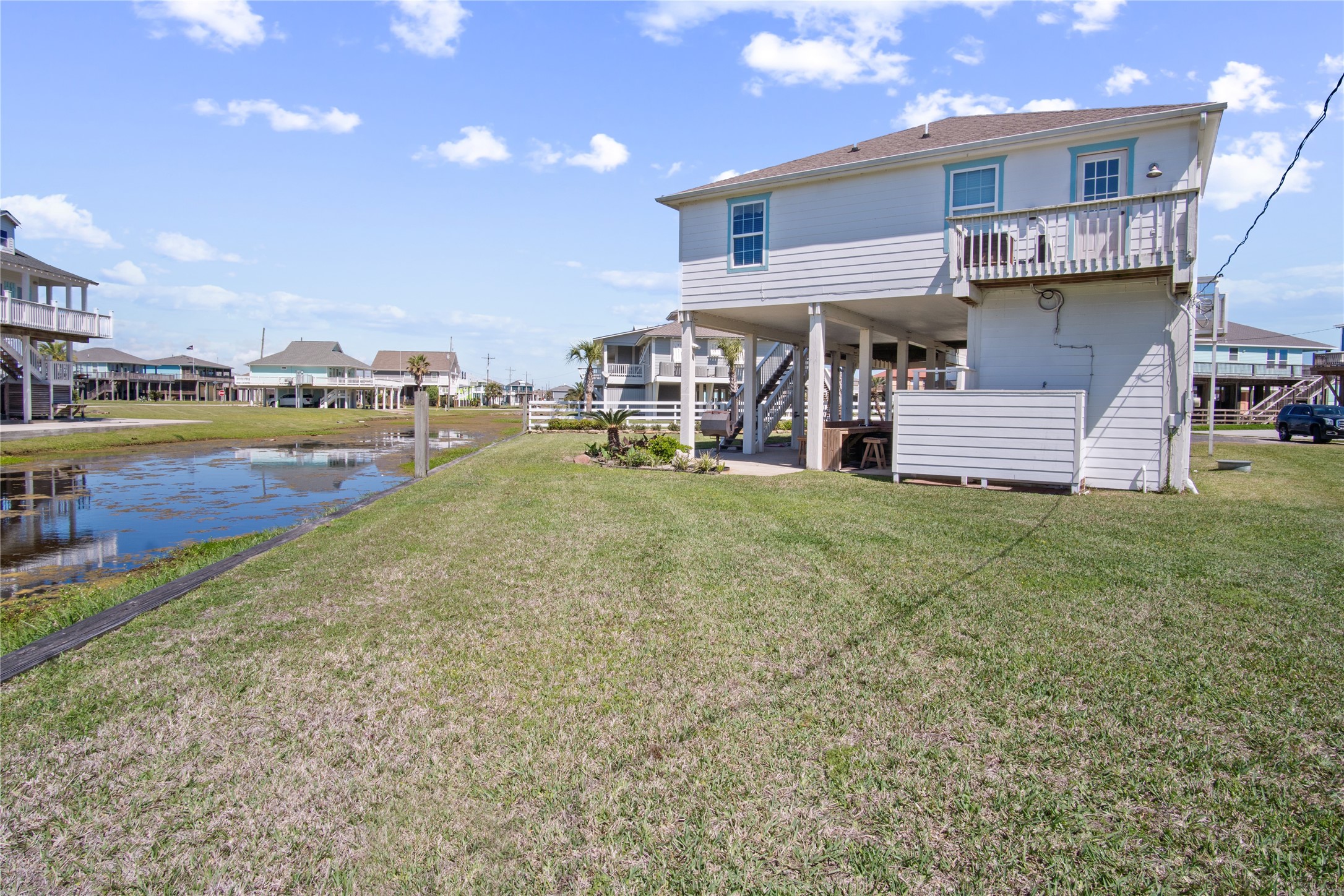 2371 Sandman Crystal Beach, TX 77650 - Photo 6 of 38 a view of a house with a swimming pool and sitting area