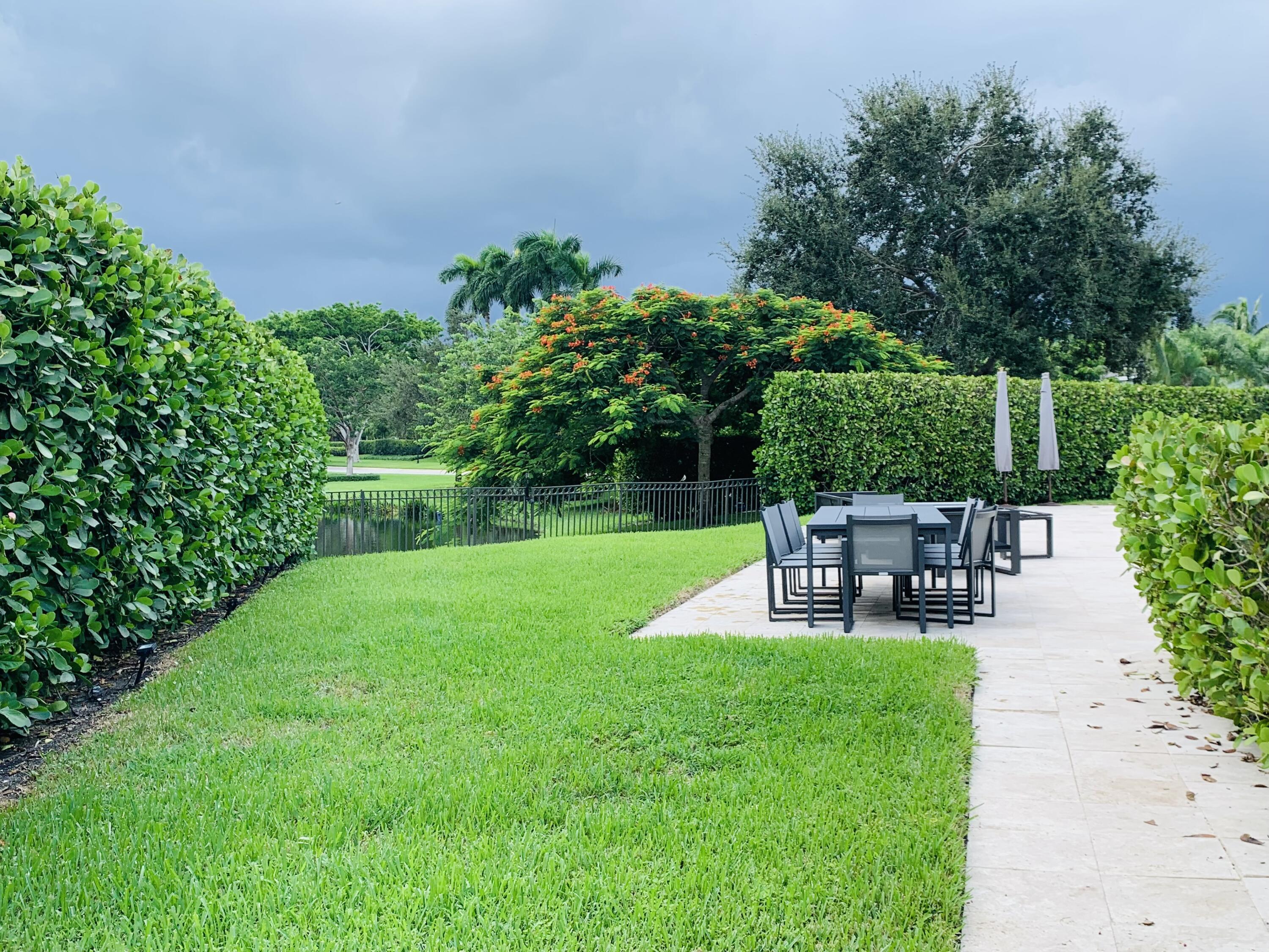 3381 Northwest 53rd Circle Boca Raton, FL 33496 - Photo 19 of 24 Grassy Sideyard