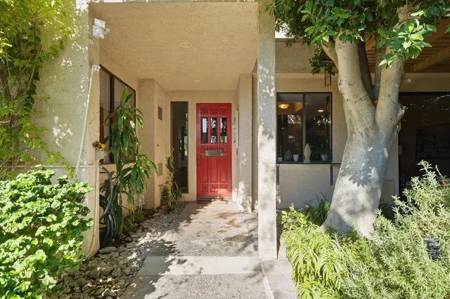 a front view of a house with a porch