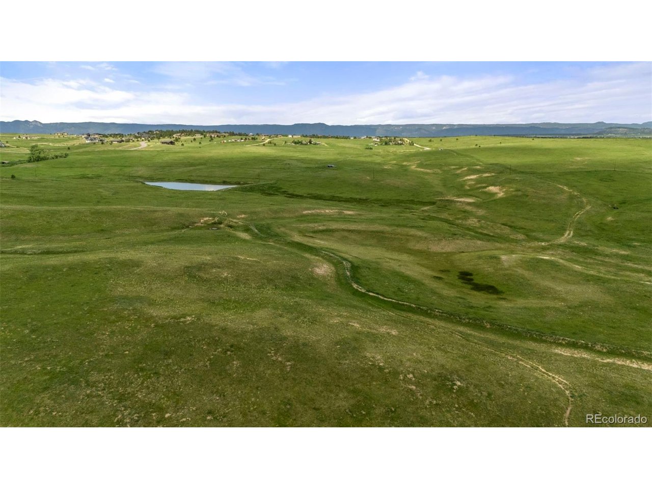 1 Steppler Road Colorado Springs, CO 80908 - Photo 4 of 9 a black and white photo of a big yard