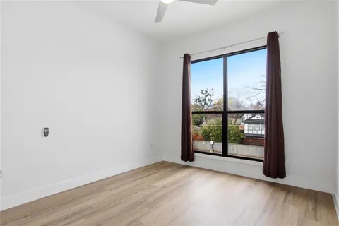 a view of a storage & utility room with wooden floor