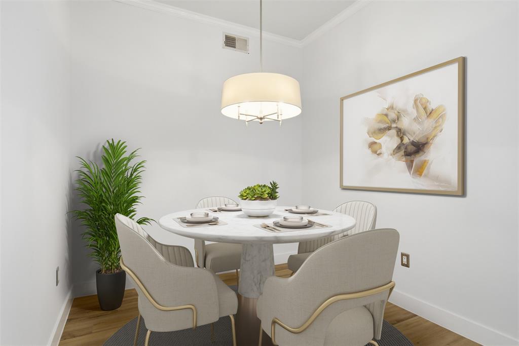 4414 Cedar Springs Road, Unit 312 Dallas, TX 75219 - Photo 3 of 30 a dining room with furniture and wooden floor