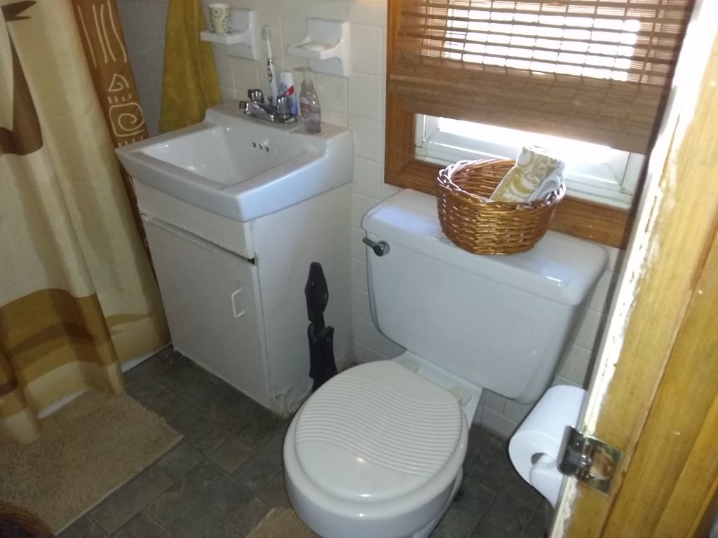 72-74 Tulsa Street Springfield, MA 01118 - Photo 9 of 16 a bathroom with a sink and a toilet