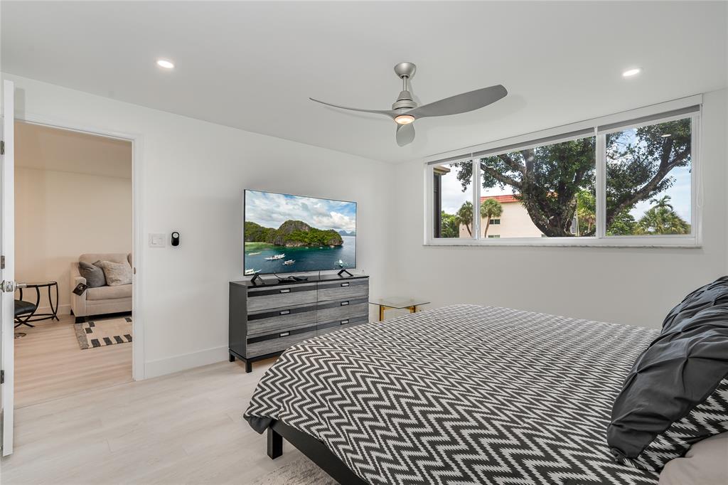 411 South Hollybrook Drive, Unit 109 Pembroke Pines, FL 33025 - Photo 13 of 61 a bedroom with furniture and a window