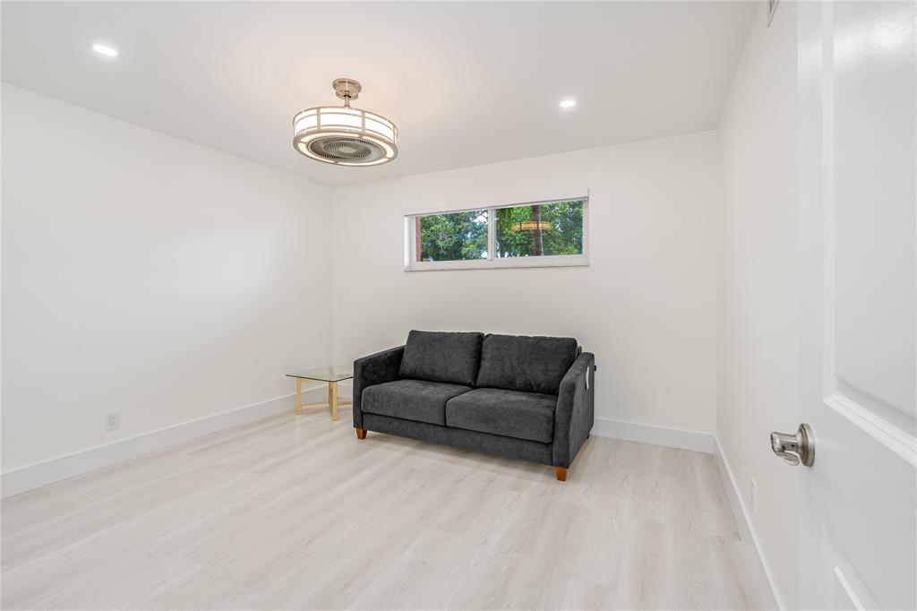 411 South Hollybrook Drive, Unit 109 Pembroke Pines, FL 33025 - Photo 16 of 61 a view of a livingroom with furniture and window