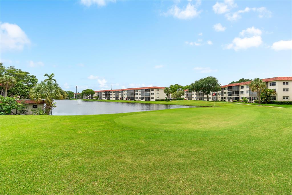 411 South Hollybrook Drive, Unit 109 Pembroke Pines, FL 33025 - Photo 20 of 61 a view of a green field