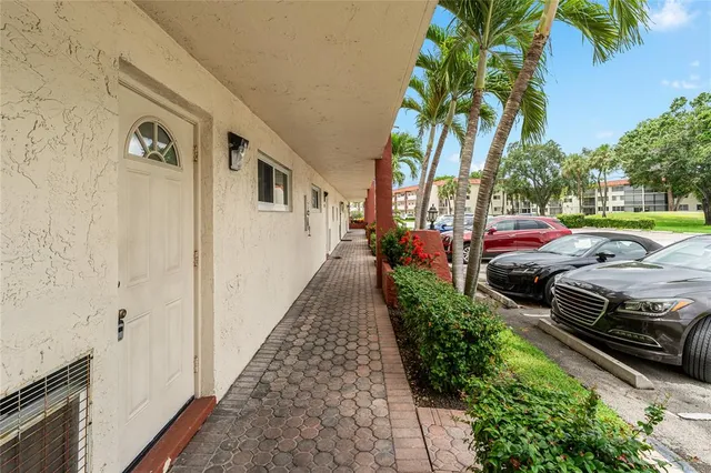 a view of a golf course with a lake