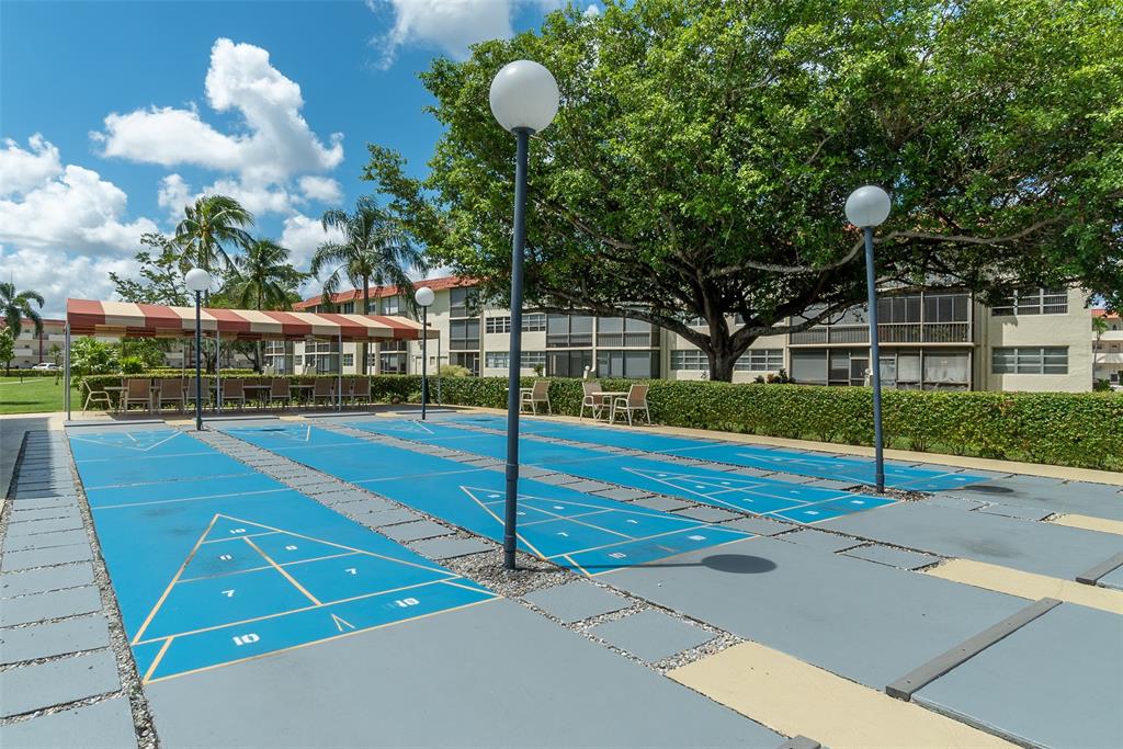 411 South Hollybrook Drive, Unit 109 Pembroke Pines, FL 33025 - Photo 31 of 61 a view of a basket ball ground
