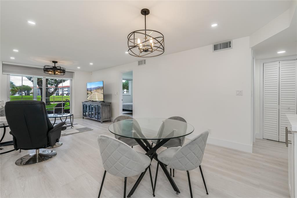 411 South Hollybrook Drive, Unit 109 Pembroke Pines, FL 33025 - Photo 7 of 61 a view of a room with gym equipment