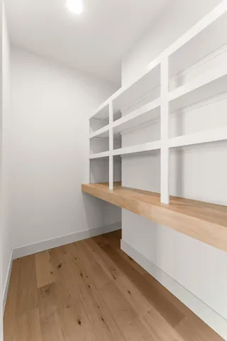 a view of an empty walk in closet