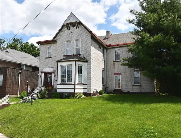 a front view of house with yard