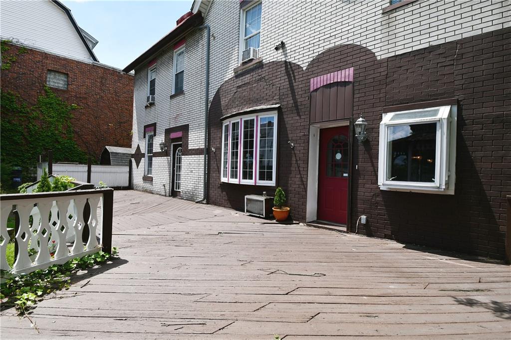 108 Locust Street Pittsburgh, PA 15210 - Photo 20 of 36 a view of a house with entrance gate