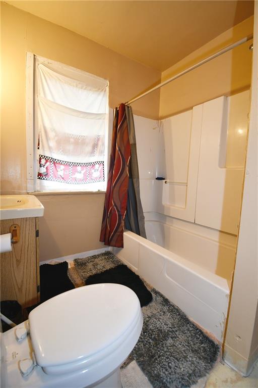 108 Locust Street Pittsburgh, PA 15210 - Photo 35 of 36 a bathroom with a sink and a mirror