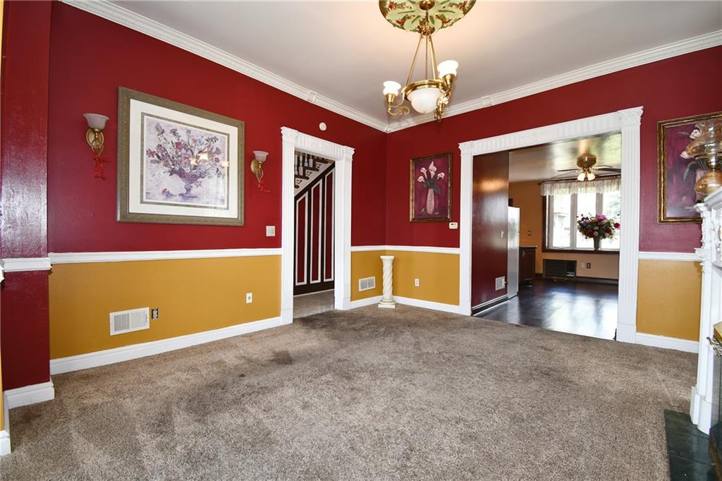108 Locust Street Pittsburgh, PA 15210 - Photo 4 of 36 a view of a livingroom with a workspace
