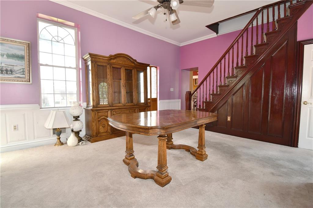 108 Locust Street Pittsburgh, PA 15210 - Photo 10 of 36 a dining room with furniture and window