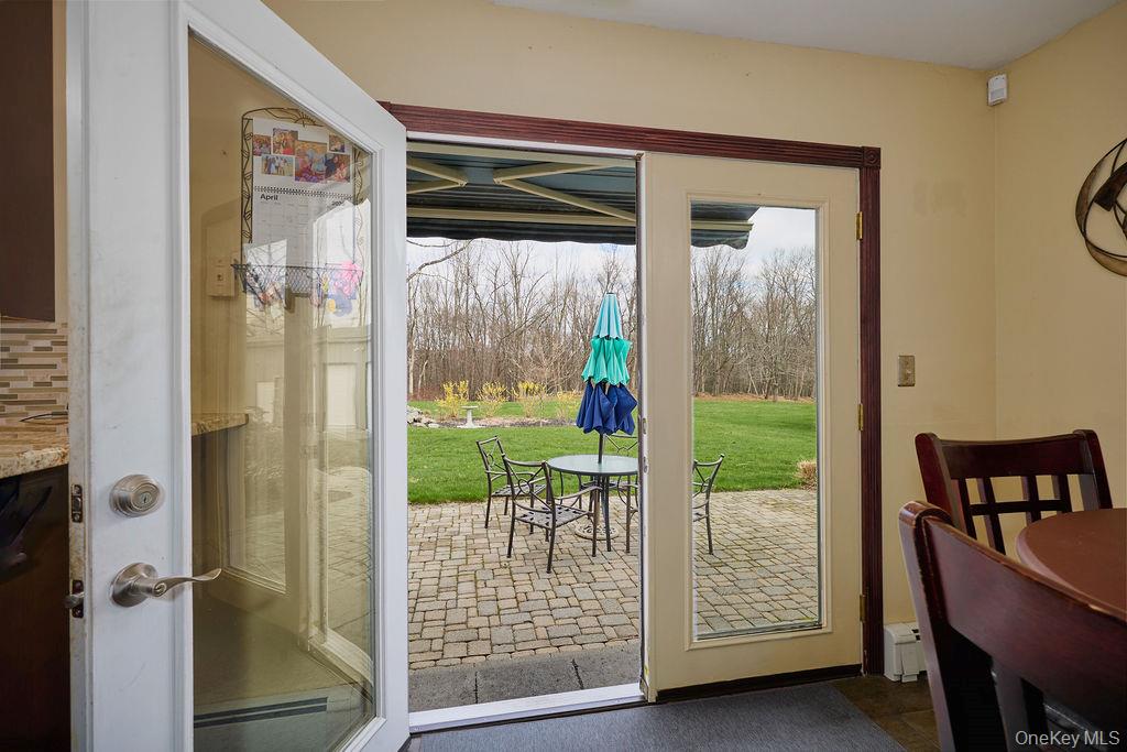 180 Ridge Drive Middletown, NY 10940 - Photo 17 of 43 Breakfast nook leading out to rear patio